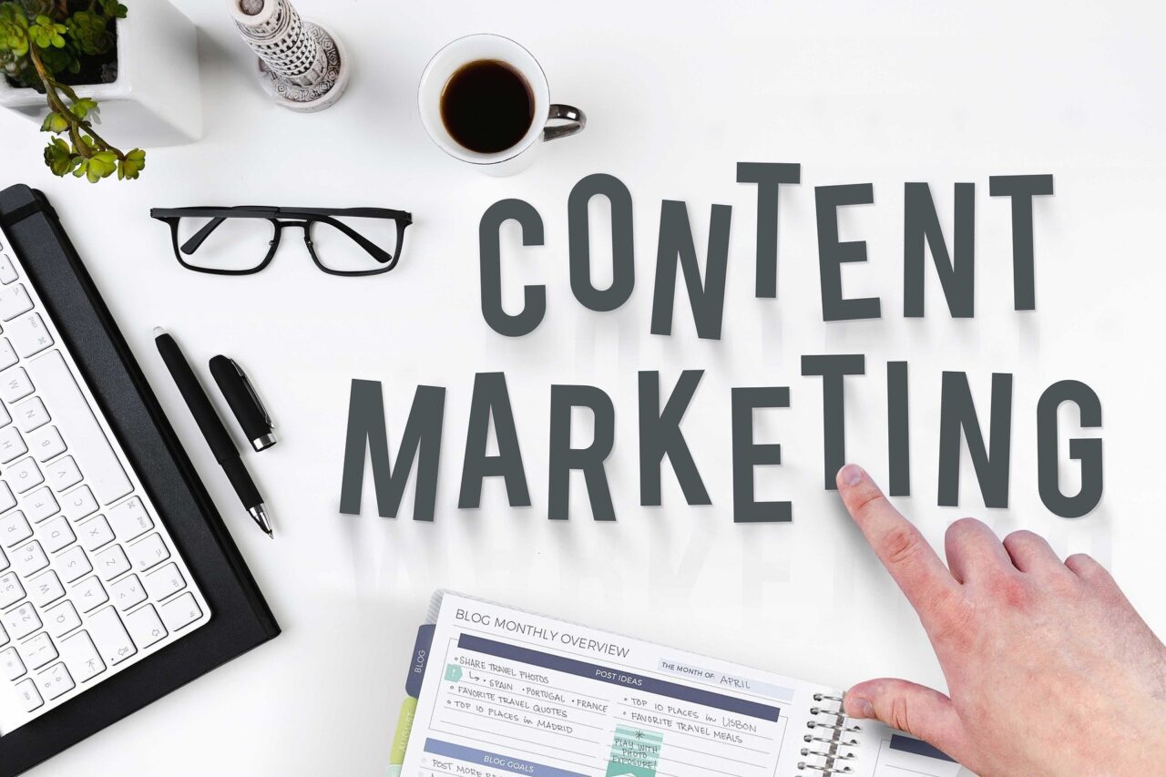 Image of a hand pointing to the words "content marketing"