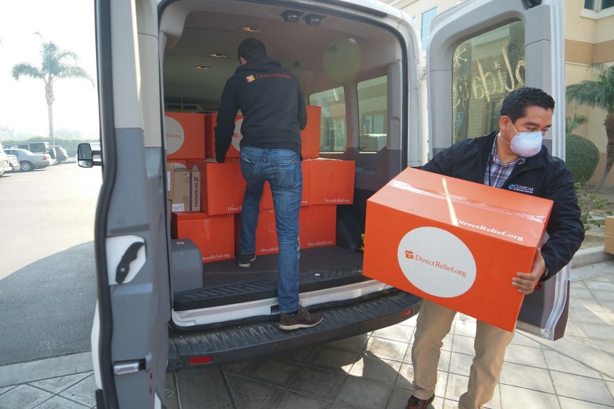 N95 respirators, inhalers, eye drops and other medical supplies are delivered to Clinicas del Camino Real, a health center serving patients in Oxnard, California, during the Thomas Fire